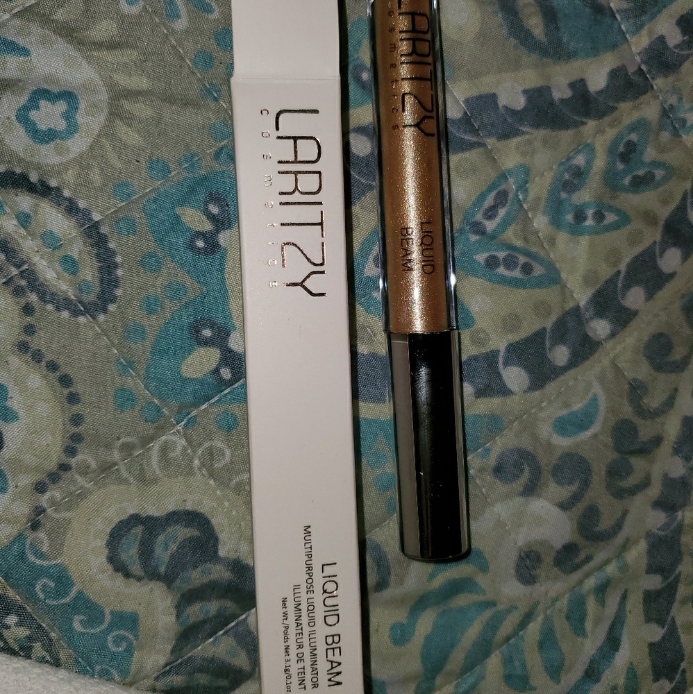 Laritzy-liquid beam multi purpose illuminator.